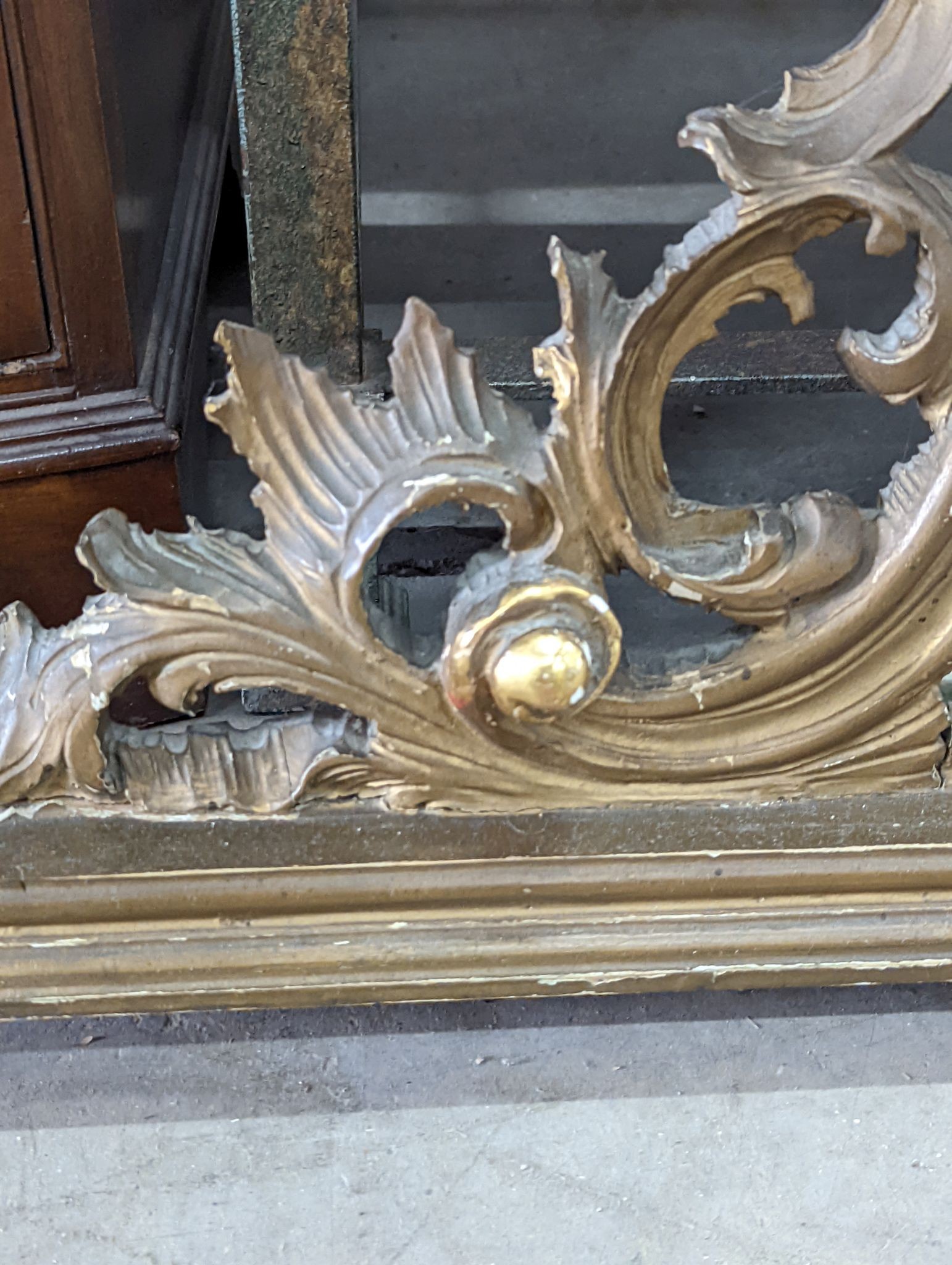 A Victorian style carved giltwood overmantel mirror, width 140cm, height 125cm